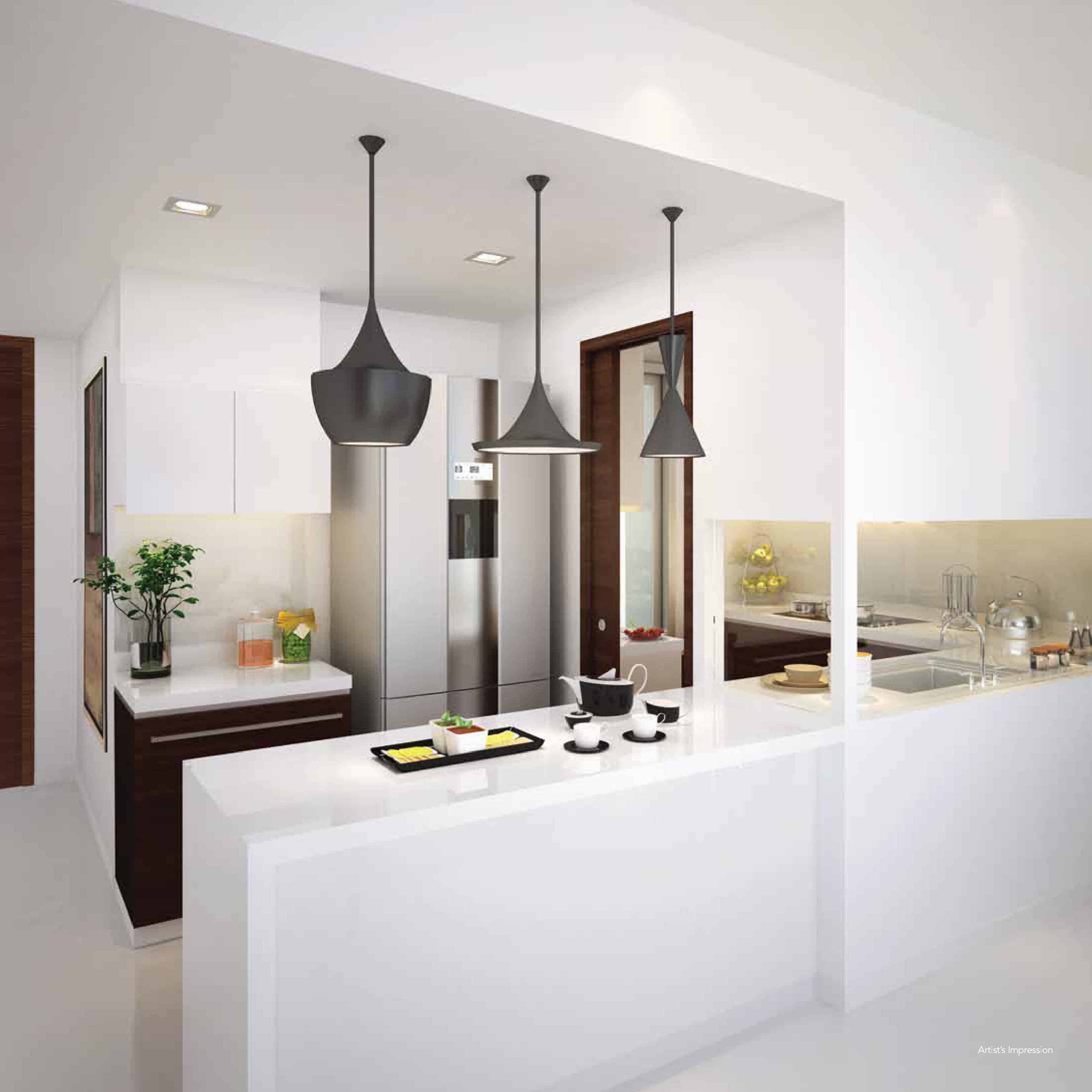 Modern kitchen at Riversound Residence featuring a sleek white countertop with a breakfast bar, contemporary pendant lighting, and built-in stainless steel appliances. The space is accented with dark wood cabinetry and minimalist decor, offering a clean and functional layout ideal for both cooking and entertaining.