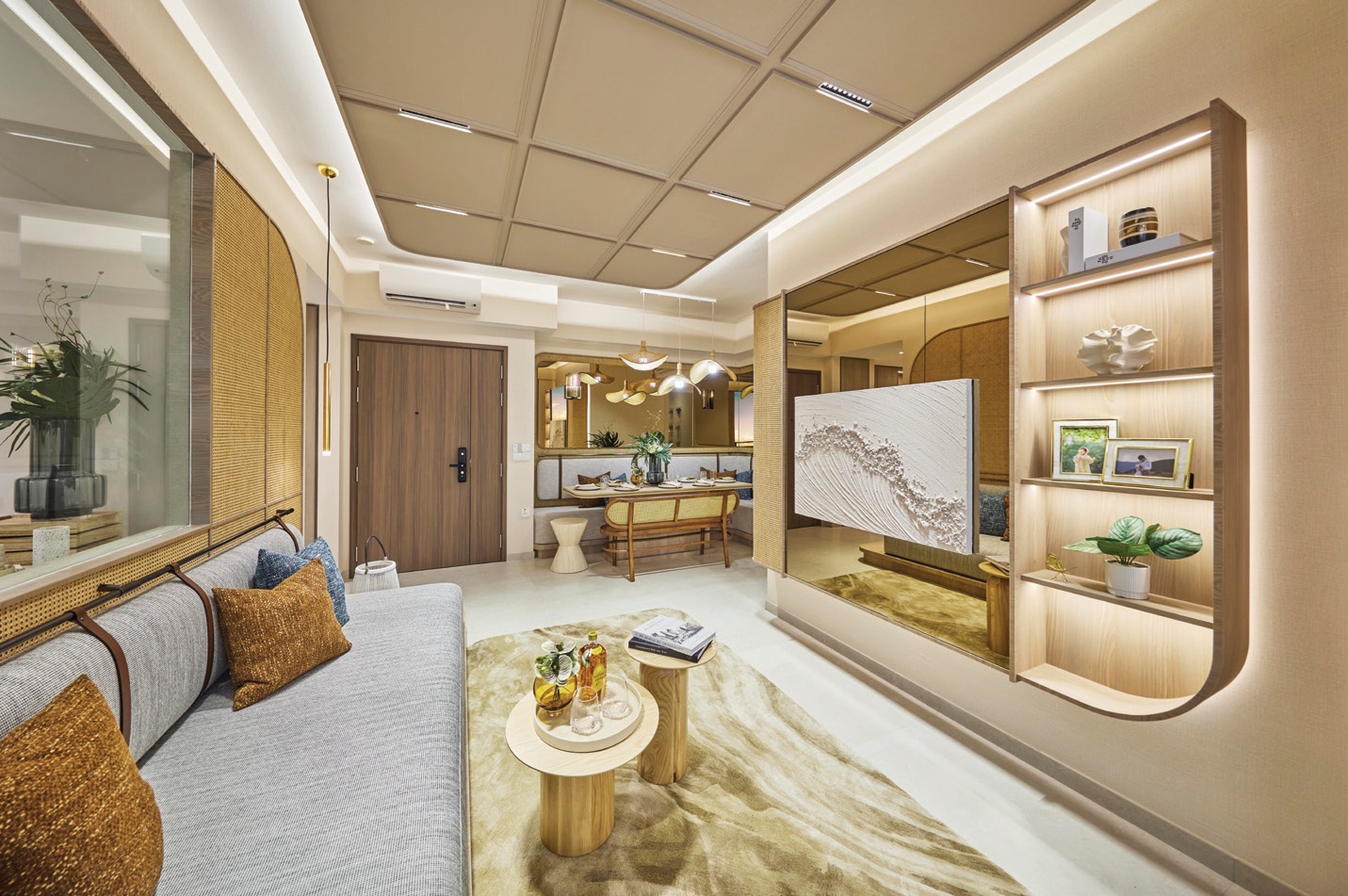 Interior of a Bagnall Haus show unit featuring a contemporary living and dining area with warm wood finishes, built-in shelving, decorative mirrors and modern furnishings.